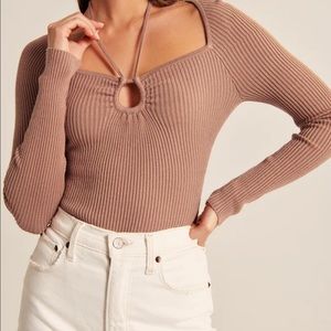 Blush bodysuit NEVER WORN